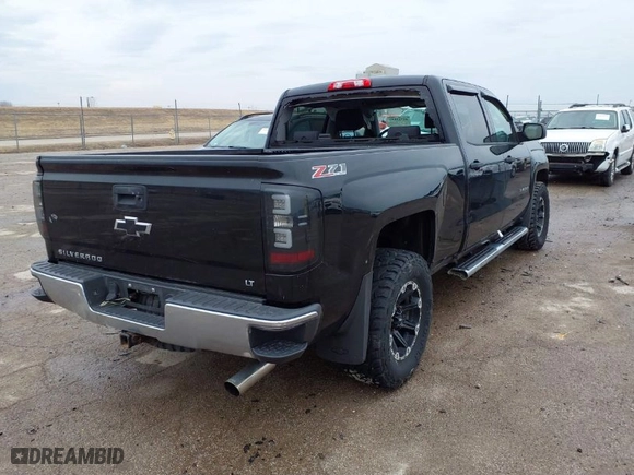 2014 Chevrolet Silverado 1500 LT with VIN 3GCUKREC9EG214717, listed as a IAAI auction lot 41725892 with 133,413 mi miles. Bid and sale history available at carsss.com. Image 4.