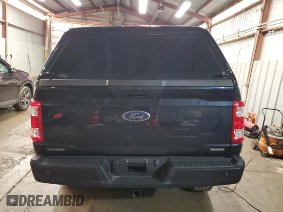 2023 Ford F-150 with VIN 1FTFW1P83PKE89261, listed as a Copart auction lot 46786025 with 9,079 mi miles and Salvage title. Bid and sale history available at DreamBid. Image 6.