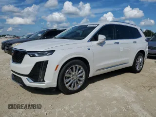 2022 Cadillac XT6 Premium Luxury with VIN 1GYKPCRS0NZ182810, listed as a Copart auction lot 74277474 with 0 mi miles and Salvage Title. Bid and sale history available at carsss.com. Image 1.