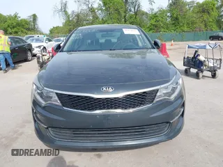 2016 Kia Optima LX with VIN KNAGT4L37G5073752, listed as a IAAI auction lot 42132621 with 136,818 mi miles. Bid and sale history available at carsss.com. Image 12.