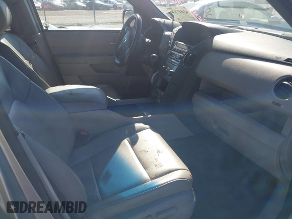 2015 Honda Pilot EX-L with VIN 5FNYF3H69FB001265, listed as a IAAI auction lot 41017830 with 188,572 mi miles and . Bid and sale history available at carsss.com. Image 5.