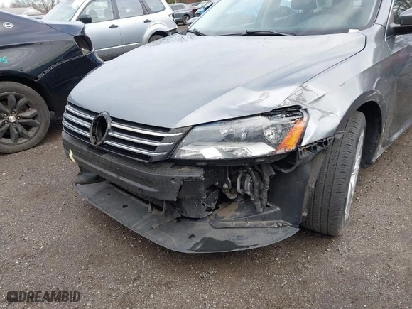 2014 Volkswagen Passat SE w/Sunroof with VIN 1VWBT7A3XEC069637, listed as a IAAI auction lot 41802276 with 119,945 mi miles. Bid and sale history available at carsss.com. Image 6.