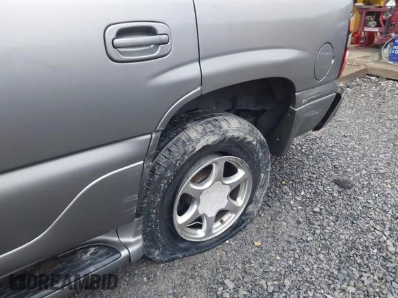2005 GMC Yukon Denali z VIN 1GKEK63U25J228296, wystawiony jako IAAI lot #40980307 z przebiegiem 192 353 mil mil oraz . Historia ofert i sprzedaży dostępna na DreamBid. Obrazek 6.