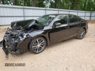 2023 Honda Civic Touring z VIN 2HGFE1F98PH312033, wystawiony jako Copart lot #54095135 z przebiegiem Nie podano mil oraz Szkoda całkowita • Salvage title. Historia ofert i sprzedaży dostępna na DreamBid. Obrazek 1.