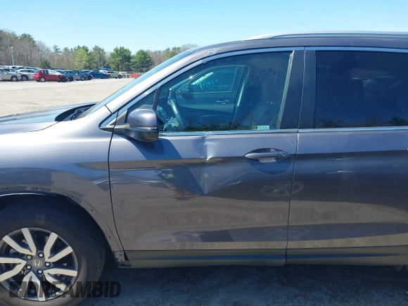 2021 Honda Pilot EX-L with VIN 5FNYF6H59MB016354, listed as a IAAI auction lot 42108020 with 61,436 mi miles and . Bid and sale history available at DreamBid. Image 18.