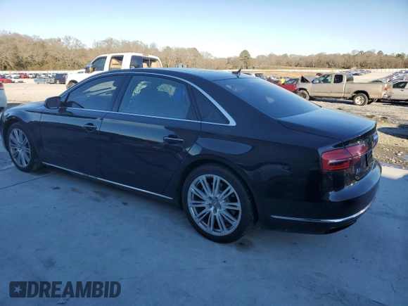 2015 Audi A8 4.0T with VIN WAU32AFD9FN033398, listed as a Copart auction lot 87655925 with 134,712 mi miles and Salvage title. Bid and sale history available at DreamBid. Image 2.