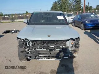 2022 Rivian R1T Adventure z VIN 7FCTGAAA5NN007018, wystawiony jako IAAI lot #42018939 z przebiegiem 41 991 mil mil oraz . Historia ofert i sprzedaży dostępna na DreamBid. Obrazek 13.