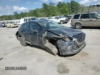 2018 Mazda CX-3 Grand Touring z VIN JM1DKFD79J0329416, wystawiony jako Copart lot #51708325 z przebiegiem 64 597 mil mil oraz Szkody całkowita. Historia ofert i sprzedaży dostępna na DreamBid. Obrazek 12.