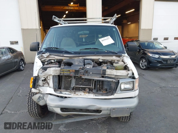 2000 Ford Econoline Cargo with VIN 1FTNS2422YHB94809, listed as a IAAI auction lot 40999427 with 154,779 mi miles and . Bid and sale history available at DreamBid. Image 13.