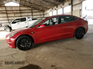 2020 Tesla Model 3 Standard Range Plus with VIN 5YJ3E1EAXLF631396, listed as a Copart auction lot 44765985 with 137,280 mi miles and Clean Title. Bid and sale history available at DreamBid. Image 1.