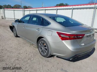 2016 Toyota Avalon Limited with VIN 4T1BK1EB7GU215795, listed as a IAAI auction lot 41244916 with 127,006 mi miles. Bid and sale history available at carsss.com. Image 3.