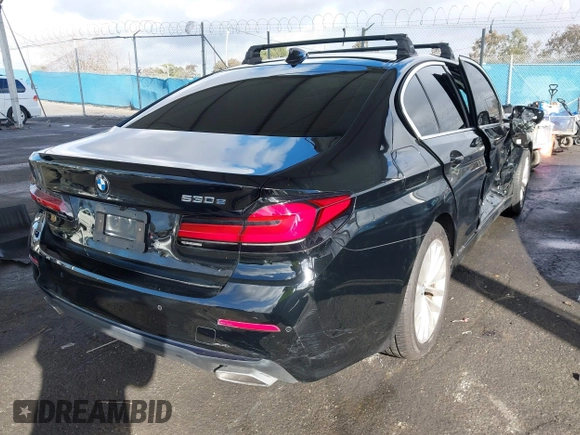2021 BMW 5 Series 530e with VIN WBA13AG07MCF87003, listed as a IAAI auction lot 41550152 with 52,214 mi miles and . Bid and sale history available at carsss.com. Image 4.