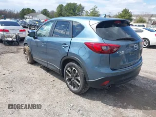 2016 Mazda CX-5 Grand Touring with VIN JM3KE4DY0G0629924, listed as a IAAI auction lot 41878154 with 78,196 mi miles. Bid and sale history available at carsss.com. Image 3.