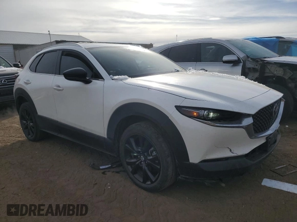 2021 Mazda CX-30 Premium with VIN 3MVDMBDY4MM308677, listed as a Copart auction lot 81869044 with 32,362 mi miles and Salvage Title. Bid and sale history available at carsss.com. Image 4.