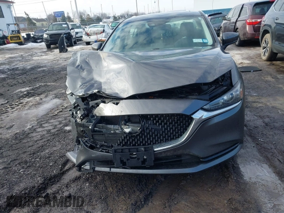 2020 Mazda 6 Grand Touring with VIN JM1GL1TY0L1521859, listed as a IAAI auction lot 41634368 with 36,709 mi miles and . Bid and sale history available at DreamBid. Image 12.
