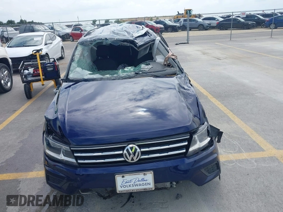 2021 Volkswagen Tiguan S with VIN 3VV1B7AX4MM150765, listed as a IAAI auction lot 42505134 with 19,590 mi miles and . Bid and sale history available at DreamBid. Image 6.