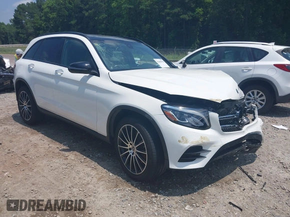 2019 Mercedes-Benz GLC 300 with VIN WDC0G4JBXK1000310, listed as a IAAI auction lot 42668396 with 22,459 mi miles and . Bid and sale history available at DreamBid. Image 1.