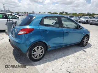2011 Mazda 2 Sport with VIN JM1DE1HY0B0122590, listed as a Copart auction lot 56162515 with 140,847 mi miles and Clean Title. Bid and sale history available at DreamBid. Image 3.