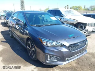 2017 Subaru Impreza Sport with VIN 4S3GTAK61H1731989, listed as a IAAI auction lot 41819366 with 93,369 mi miles. Bid and sale history available at carsss.com. Image 1.