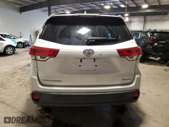 2018 Toyota Highlander SE with VIN 5TDJZRFHXJS542815, listed as a Copart auction lot 57304995 with 124,052 mi miles and Salvage title. Bid and sale history available at DreamBid. Image 6.