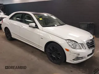 2012 Mercedes-Benz E-Class E 350 Luxury with VIN WDDHF8JB9CA557669, listed as a IAAI auction lot 41869888 with 124,187 mi miles. Bid and sale history available at carsss.com. Image 1.
