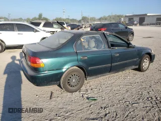 1997 Honda Civic LX with VIN 1HGEJ6570VL028030, listed as a Copart auction lot 69479674 with 160,958 mi miles and Salvage Title. Bid and sale history available at carsss.com. Image 3.