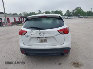 2016 Mazda CX-5 Sport with VIN JM3KE2BY1G0875484, listed as a IAAI auction lot 41838122 with 166,986 mi miles. Bid and sale history available at carsss.com. Image 16.