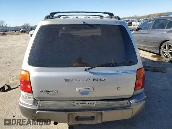1999 Subaru Forester S with VIN JF1SF6559XH747645, listed as a Copart auction lot 83070134 with 0 mi miles and Salvage Title. Bid and sale history available at carsss.com. Image 6.