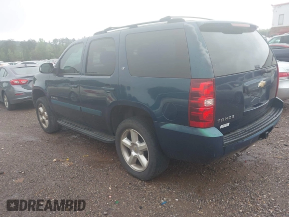 2007 Chevrolet Tahoe LT z VIN 1GNFC13J97R157437, wystawiony jako IAAI lot #41962796 z przebiegiem Nie podano mil oraz . Historia ofert i sprzedaży dostępna na DreamBid. Obrazek 3.