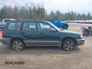 2003 Subaru Forester XS with VIN JF1SG65663H738935, listed as a IAAI auction lot 42119765 with 200,141 mi miles. Bid and sale history available at carsss.com. Image 14.