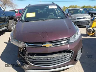 2021 Chevrolet Trax LT with VIN KL7CJPSM4MB364271, listed as a IAAI auction lot 41861337 with 65,930 mi miles. Bid and sale history available at carsss.com. Image 12.