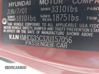 2002 Hyundai Accent GL with VIN KMHCG35C32U157056, listed as a IAAI auction lot 41538381 with 127,518 mi miles. Bid and sale history available at carsss.com. Image 9.