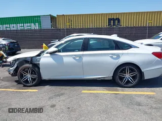 2021 Honda Accord Touring with VIN 1HGCV2F92MA024124, listed as a IAAI auction lot 42353443 with 22,457 mi miles and . Bid and sale history available at DreamBid. Image 14.