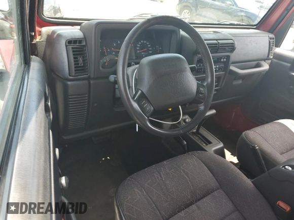 2001 Jeep Wrangler Sport with VIN 1J4FA49S51P365327, listed as a Copart auction lot 61720115 with 194,086 mi miles and Salvage title. Bid and sale history available at DreamBid. Image 8.