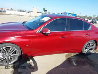 2014 Infiniti Q50 Sport with VIN JN1BV7AP4EM676615, listed as a IAAI auction lot 42007415 with 80,276 mi miles and . Bid and sale history available at DreamBid. Image 14.