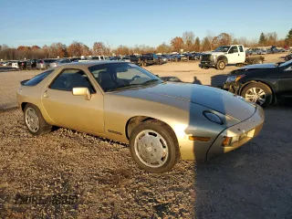 1984 Porsche 928 z VIN WP0JB092XES862382, wystawiony jako Copart lot #79716354 z przebiegiem 117 599 mil mil oraz Szkody całkowita. Historia ofert i sprzedaży dostępna na DreamBid. Obrazek 4.