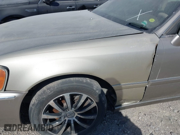 2002 Acura RL with VIN JH4KA96502C008421, listed as a IAAI auction lot 39372947 with Not provided miles and . Bid and sale history available at DreamBid. Image 6.