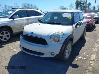 2014 MINI Countryman with VIN WMWZB3C52EWR42241, listed as a IAAI auction lot 41734963 with 121,325 mi miles and . Bid and sale history available at DreamBid. Image 2.