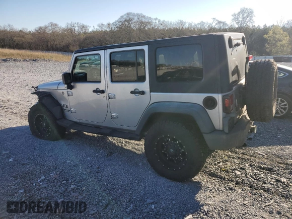 2009 Jeep Wrangler Unlimited X with VIN 1J4GA39179L756228, listed as a Copart auction lot 50086445 with 158,274 mi miles and Salvage Title. Bid and sale history available at carsss.com. Image 2.