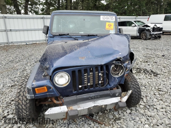 2001 Jeep Wrangler Sport with VIN 1J4FA49S01P363856, listed as a Copart auction lot 62494785 with 154,782 mi miles and Salvage title. Bid and sale history available at DreamBid. Image 5.