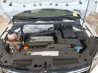 2016 Volkswagen Tiguan S with VIN WVGBV7AX0GW532236, listed as a IAAI auction lot 41610575 with 104,193 mi miles and . Bid and sale history available at DreamBid. Image 10.