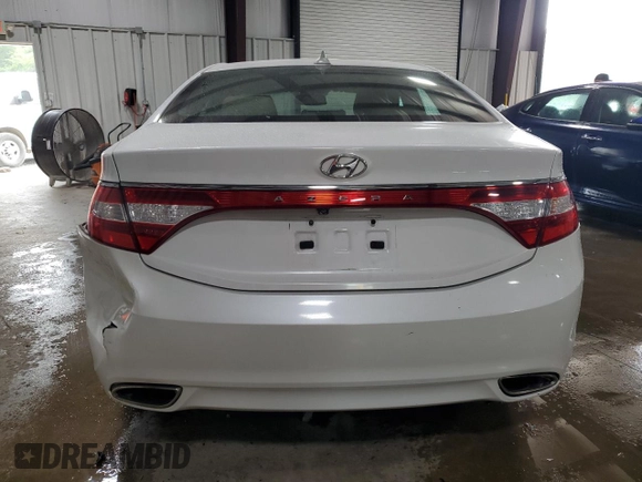 2013 Hyundai Azera z VIN KMHFG4JG7DA229084, wystawiony jako Copart lot #62580265 z przebiegiem 114 505 mil mil oraz Szkoda całkowita • Salvage title. Historia ofert i sprzedaży dostępna na DreamBid. Obrazek 6.