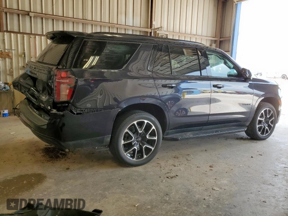 2023 Chevrolet Tahoe RST with VIN 1GNSCRKD5PR290351, listed as a Copart auction lot 58806595 with 64,909 mi miles and Salvage title. Bid and sale history available at DreamBid. Image 3.