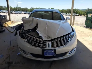 2013 Lincoln MKZ с VIN 3LN6L2G95DR809559, выставлен на аукционе Copart как лот 57581755 с пробегом 64 850 миль миль и Списание • Salvage title. История ставок и продаж доступна на DreamBid. Изображение 5.