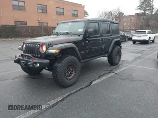 2022 Jeep Wrangler Unlimited Rubicon with VIN 1C4HJXFGXNW127064, listed as a IAAI auction lot 41491203 with 47,700 mi miles and . Bid and sale history available at DreamBid. Image 19.
