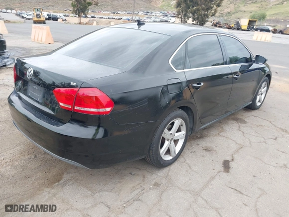 2012 Volkswagen Passat SE with VIN 1VWBP7A30CC026507, listed as a IAAI auction lot 42042850 with 202,406 mi miles. Bid and sale history available at carsss.com. Image 4.