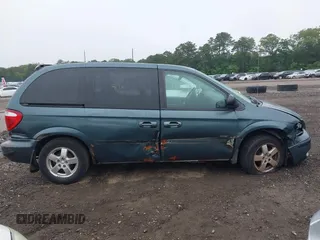 2005 Dodge Caravan SXT with VIN 1D4GP45R55B279825, listed as a IAAI auction lot 42532684 with 157,167 mi miles and . Bid and sale history available at DreamBid. Image 6.