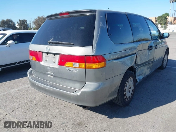 2002 Honda Odyssey LX z VIN 2HKRL18542H553437, wystawiony jako IAAI lot #41824481 z przebiegiem 222 428 mil mil oraz . Historia ofert i sprzedaży dostępna na DreamBid. Obrazek 4.