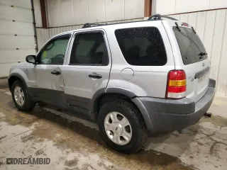 2002 Ford Escape Limited with VIN 1FMCU04122KD98349, listed as a Copart auction lot 82210654 with 129,933 mi miles and Salvage Title. Bid and sale history available at carsss.com. Image 2.