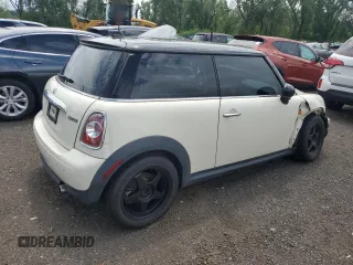 2013 MINI Hardtop with VIN WMWSU3C51DT374477, listed as a Copart auction lot 62654295 with 127,295 mi miles and Salvage title. Bid and sale history available at DreamBid. Image 3.